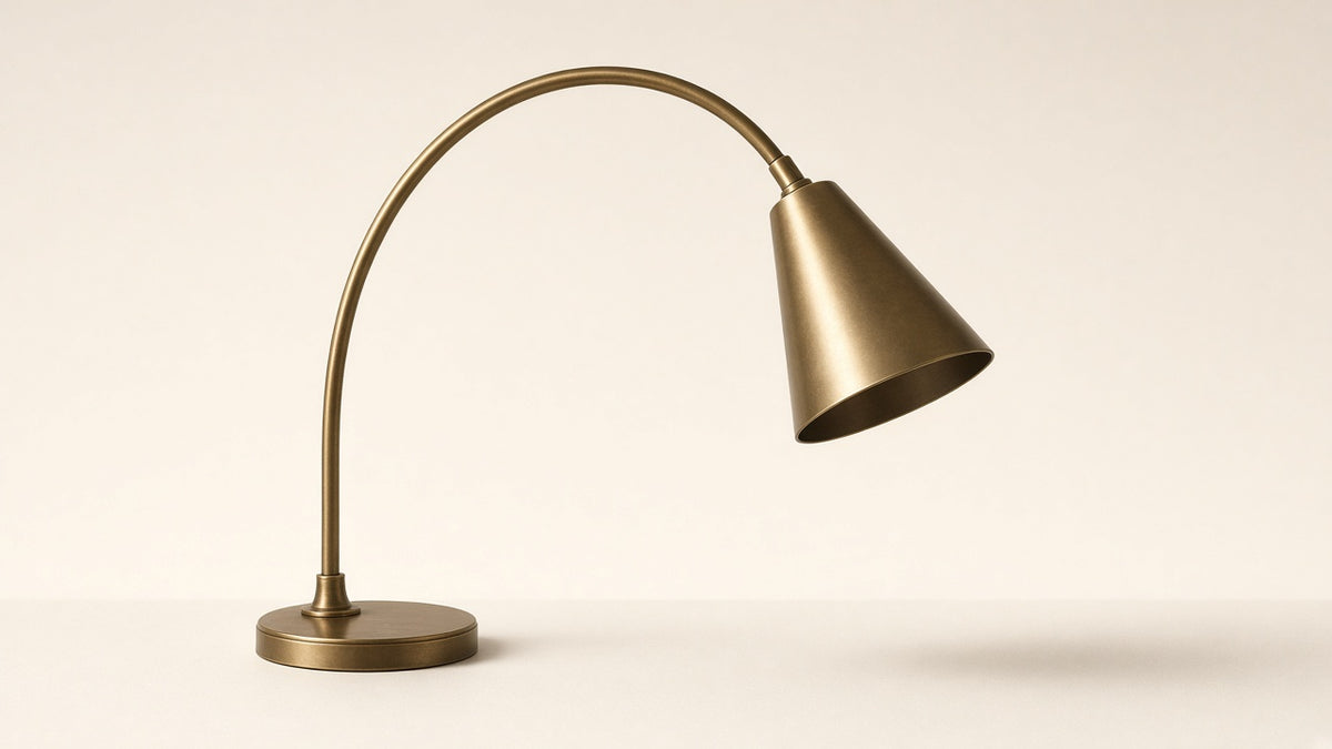 Side profile — arched brass floor lamp